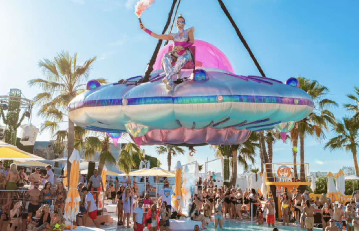 Ibiza pool party and club tour experience with DJ music and party atmosphere