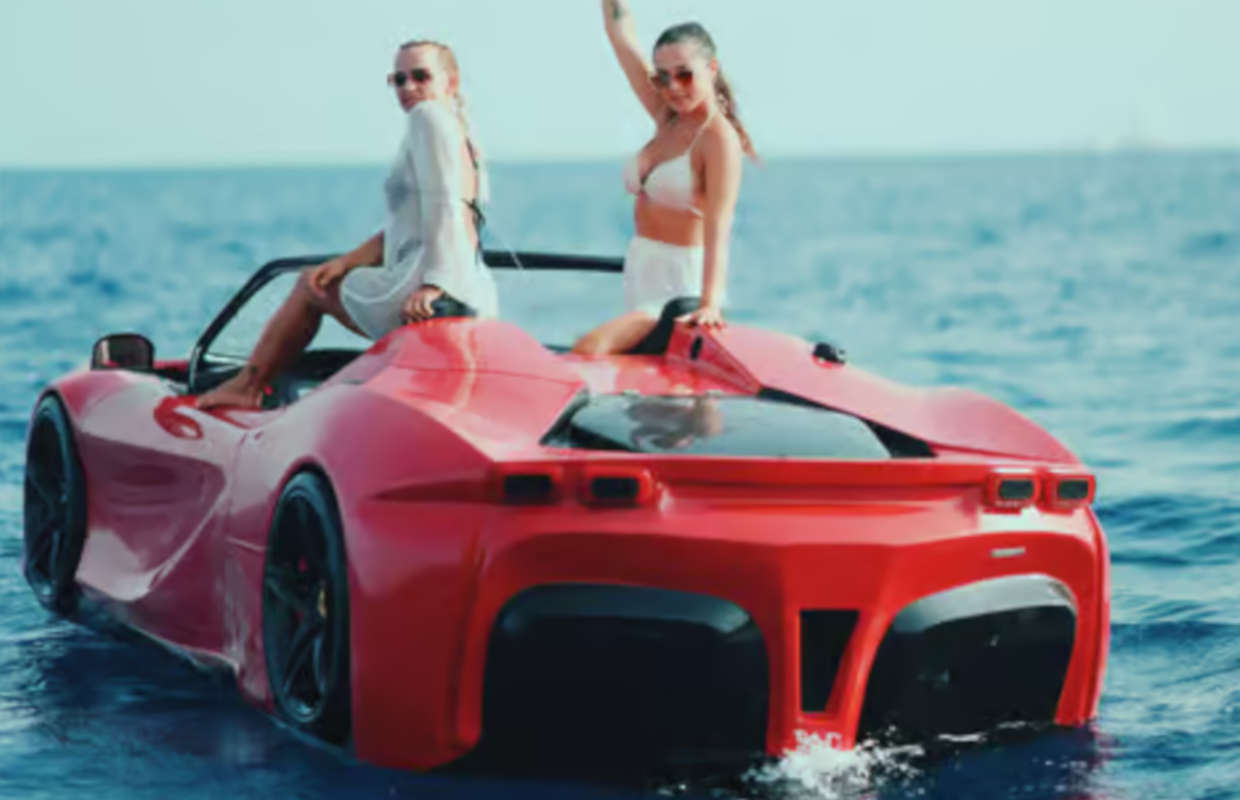 Luxury Ibiza water experience with a red amphibious sports car on the Mediterranean Sea